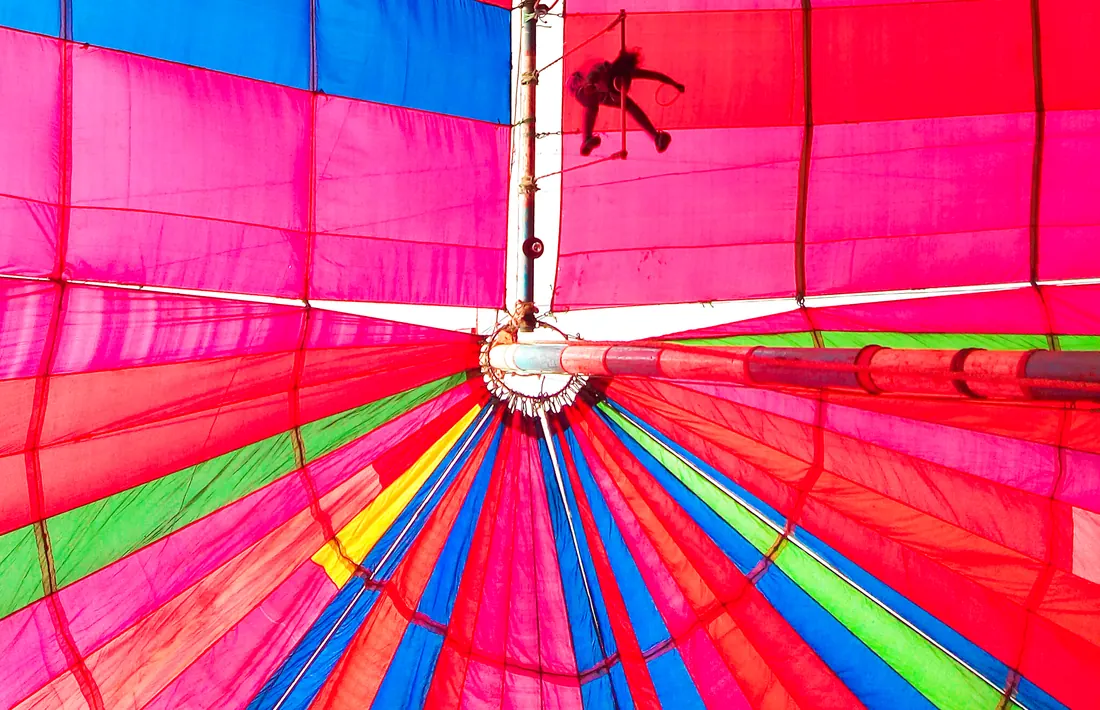 An aerial acrobat performing during a circus show